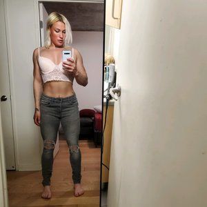 Gray frayed skinny leg jeans